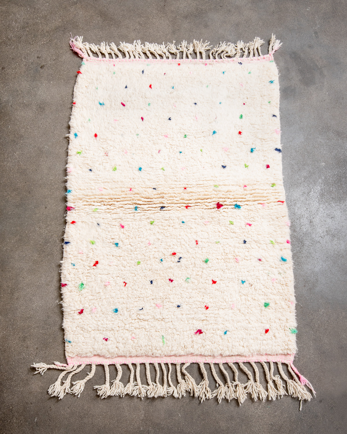 Modern, designer, handcrafted Berber rug from Morocco. Beniourain carpet with beautiful colours and patterns and fluffy wool texture.